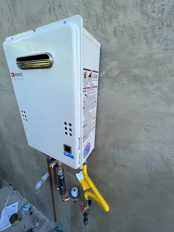 Tankless water heater installation for Avis Mills homes